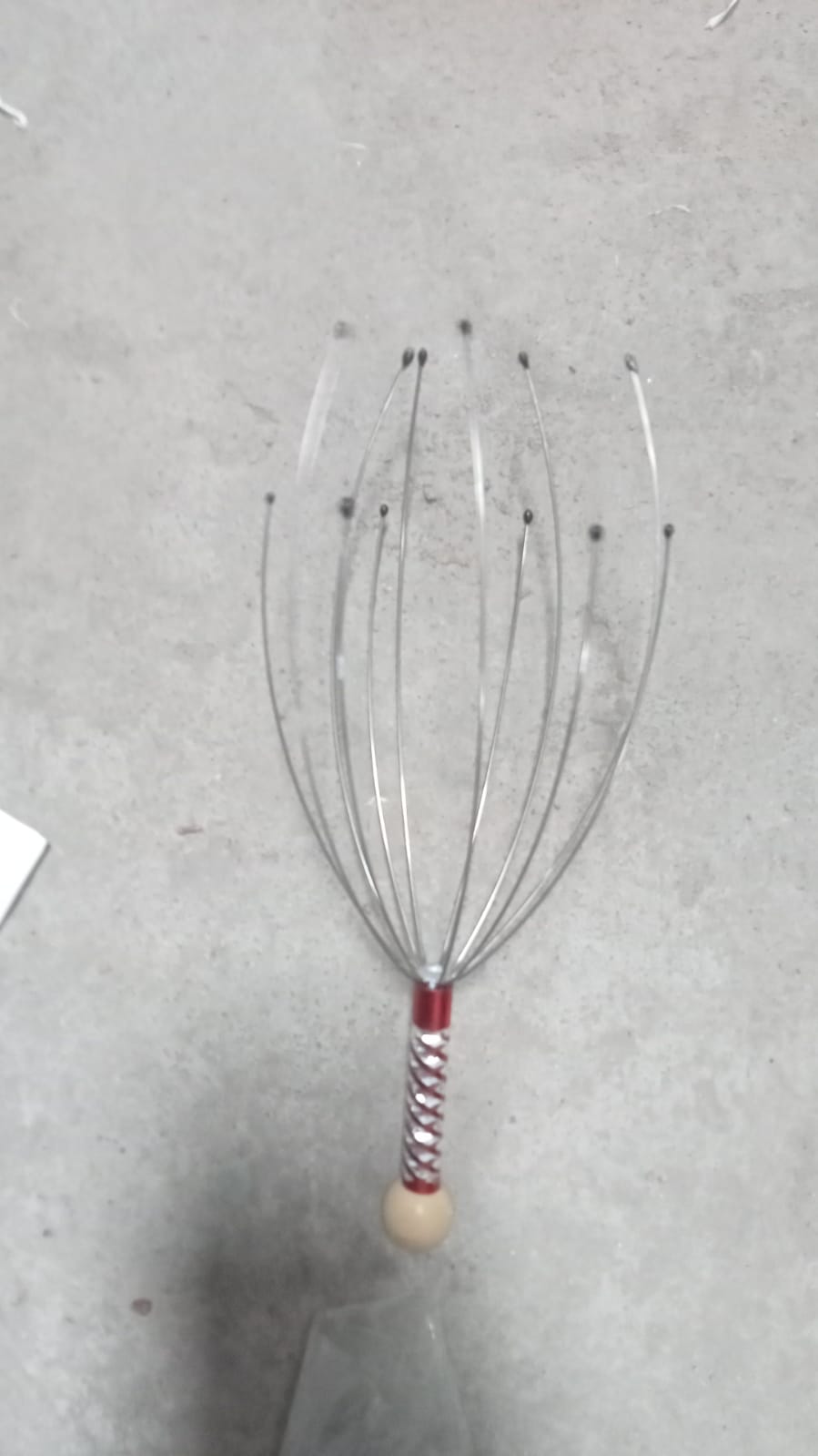 Handheld scalp massager for effective stress relief and relaxation. Handheld scalp massager for effective stress relief and relaxation.